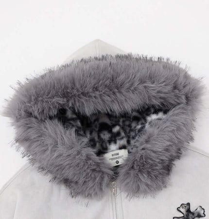 Embroidered Hooded Coat – Loose Fit featuring cozy fur-lined hood and striking embroidery detail.