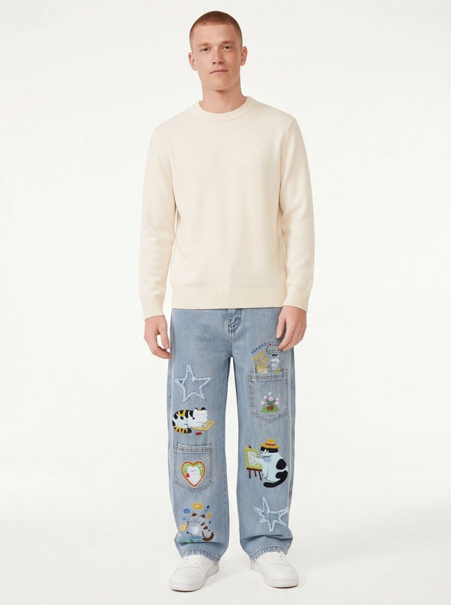 Close-up of Denim Blue cartoon embroidery denim pants, fabric
