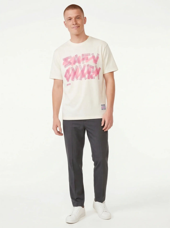 Resilient Ivory Tee lifestyle image — the piece worn in context showing natural drape and proportions