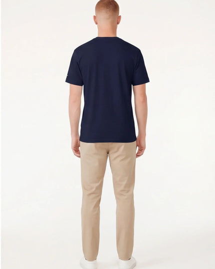 Rear view of the Maison Grozavu Taupe Tee Loom in shirt — showing the tailored hem.