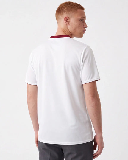 Graphite Jersey Form — overhead lifestyle shot showing the jersey as a streetwear layer