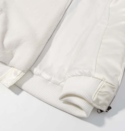 Detail of Faux Fur Hooded Winter Coat showing soft fabric, zipper closure, and ribbed cuffs.