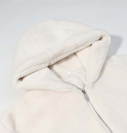 Faux Fur Hooded Winter Coat close-up of soft hood and zipper detail in cream color.
