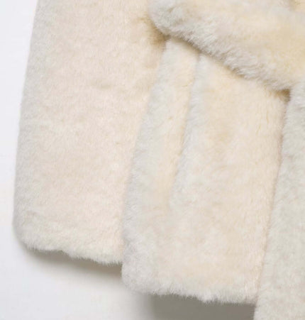 Close-up view of the faux fur texture on the Faux Fur Waistcoat Jacket – Slim Fit in classic white color.
