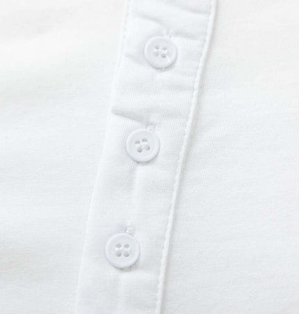 Close-up of buttons on a Fitted Long Sleeve Deconstructed TShirt showcasing high-quality craftsmanship.