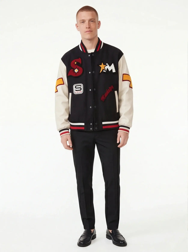 Front view of the Maison Grozavu Enduring Obsidian Top in top — showing the refined stitching.
