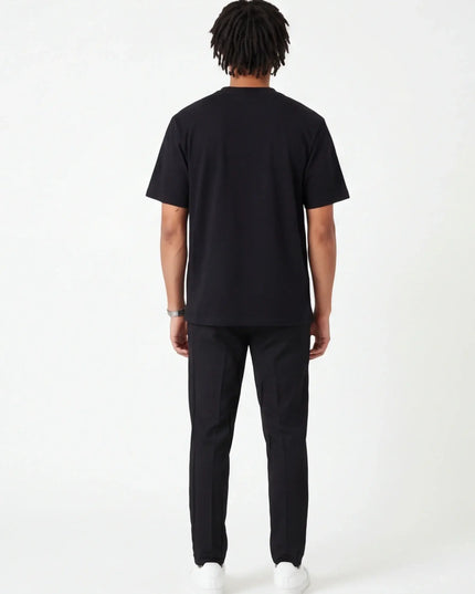 Rear view of the Maison Grozavu Sleek Carbon Tee in shirt — showing the refined stitching.