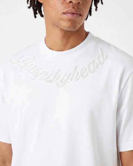 Lifestyle shot of the Maison Grozavu Sleek Carbon Tee in shirt — showing the sleek silhouette.