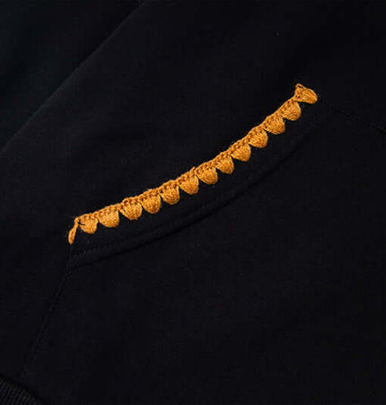 Fleece Lined Leopard Ears Hoodie detail showing pocket with unique crochet design and playful leopard print