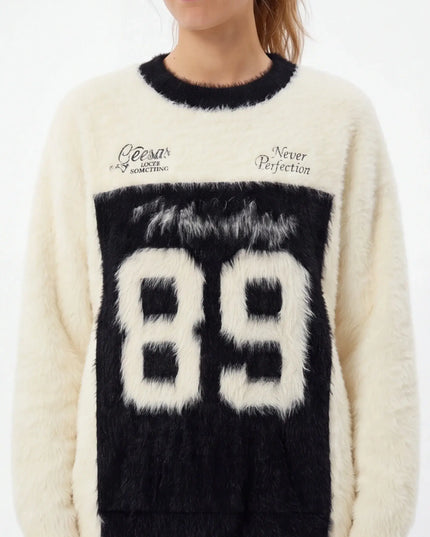 Maison Grozavu Slate Crewneck Edition in signature tone — front view showing the reinforced stitching on the hem