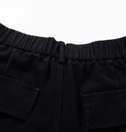 Graffiti Printed Cargo Denim Pants waistband detail with elastic and pockets, showcasing urban style and comfort.