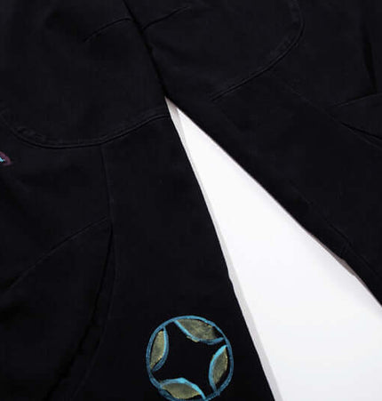 Graffiti Printed Cargo Denim Pants featuring hand-painted flower graffiti artwork and a stylish dark wash.