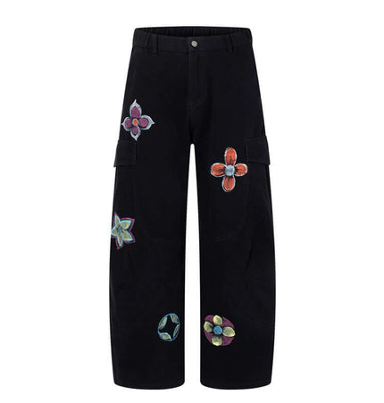 Graffiti Printed Cargo Denim Pants featuring colorful hand-painted flower designs on a black background.