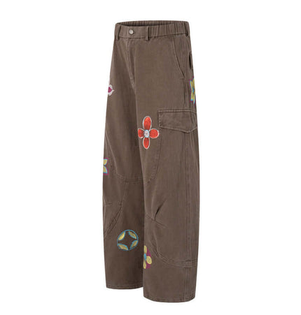 Graffiti Printed Cargo Denim Pants featuring colorful flower graffiti artwork and a loose fit silhouette.