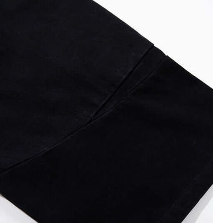 Detail of the cuff of Graffiti Printed Cargo Denim Pants showcasing the stylish design and quality fabric.