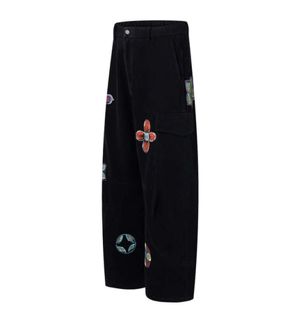 Graffiti Printed Cargo Denim Pants featuring hand-painted flower artwork and a stylish loose fit silhouette.