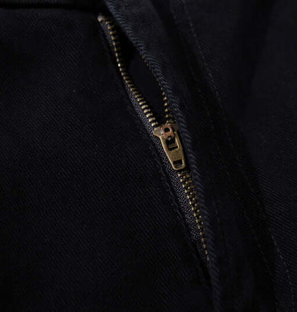 Close-up of zipper detail on Graffiti Printed Cargo Denim Pants, showcasing quality craftsmanship and urban style.