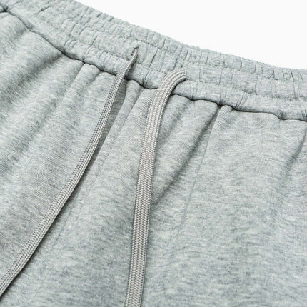 Close-up of the waistband and drawstring of Letter Print Casual Pants – Loose Fit in soft grey fabric.