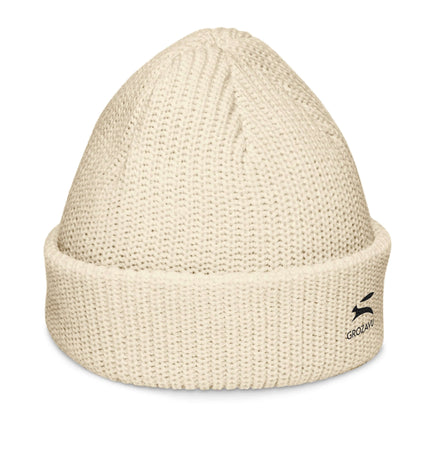Grozavu beanie in cream color with ribbed knit design, perfect for cozy and trendy winter outfits.
