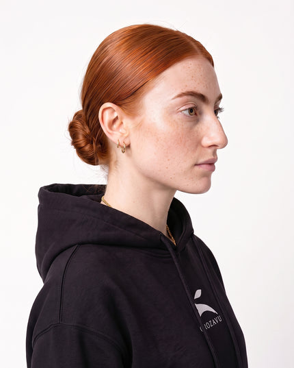 Front full-body fashion lookbook of GROZAVU Black Hoodie worn by model Sienna