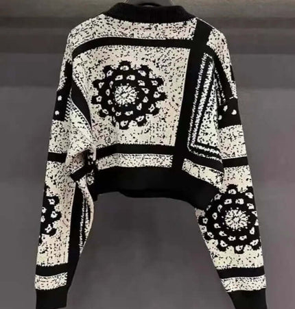 Camellia Jacquard Beaded Knit Sweater featuring artistic camellia patterns and bead embellishments.