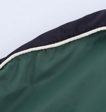 Detail view of the inner lining of the Color Block Jacket and Long Pants Set, highlighting fabric quality and design.