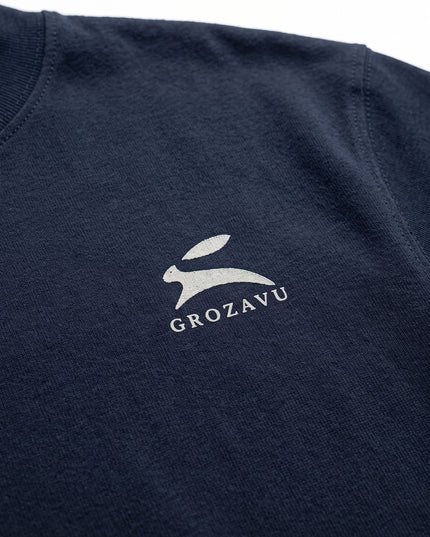 Extreme macro close-up of GROZAVU Dark Navy T-Shirt showcasing premium heavyweight fabric weave, tactile ribbing, and razor-sharp graphic print detail