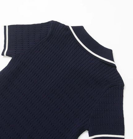 Eight-Strand Braided Knit Top – Loose Fit in navy blue, showcasing the textured knit and classic collar design.