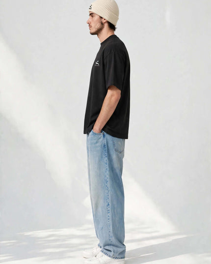 Full-body profile wearing the ribbed-knit fisherman beanie