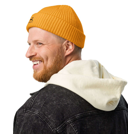 Man wearing a Grozavu beanie, showcasing the cozy and trendy fisherman-style design.