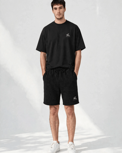 Black 280 g/m² cotton fleece shorts, full-body view