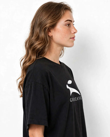 Side profile of the garment-dyed oversized tee in 220 g/m² cotton