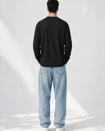Studio back view of the black heavyweight long sleeve tee