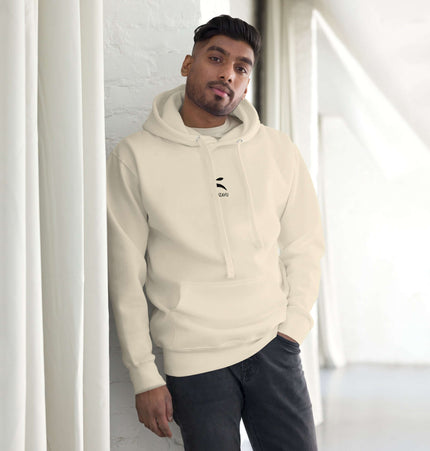Model wearing Grozavu Hoodie in cream color, featuring a front pouch pocket and stylish design.