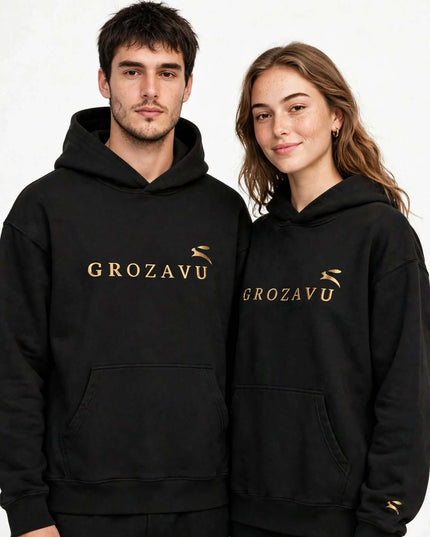 Two models in the black 280 g/m² organic cotton kangaroo hoodie