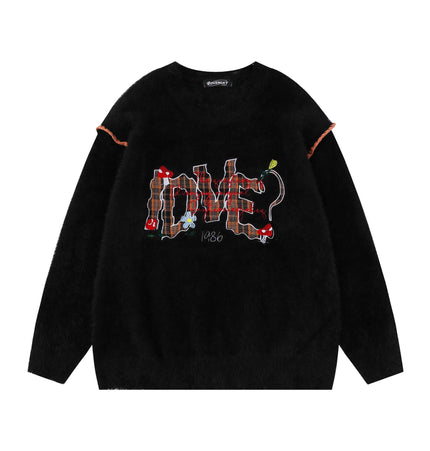 Knit Sweater with Letter Applique featuring hand-stitched design on black knit fabric, perfect for casual streetwear.