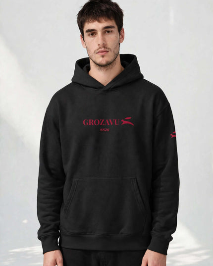Side profile of the black lined-hood sweatshirt with elastane-free rib