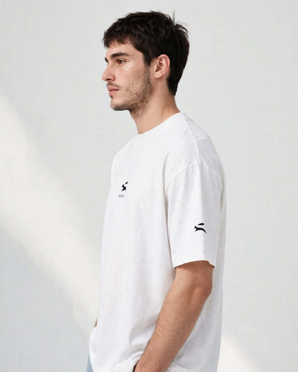 Side profile of the white wide collar tee, generous oversized fit