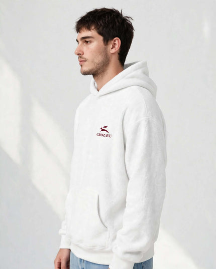 Side profile of the white mill-dyed hoodie showing the two-panel hood