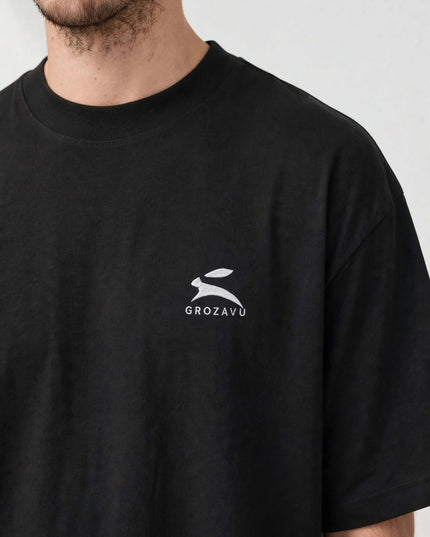 Chest embroidery detail on the black 200 g/m² organic tee