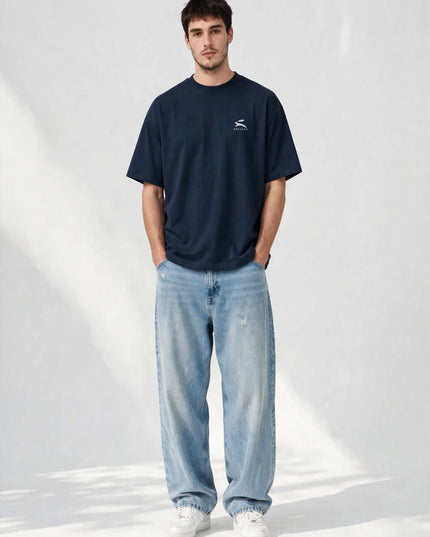 Navy oversized organic tee in 200 g/m² GOTS cotton, worn front view
