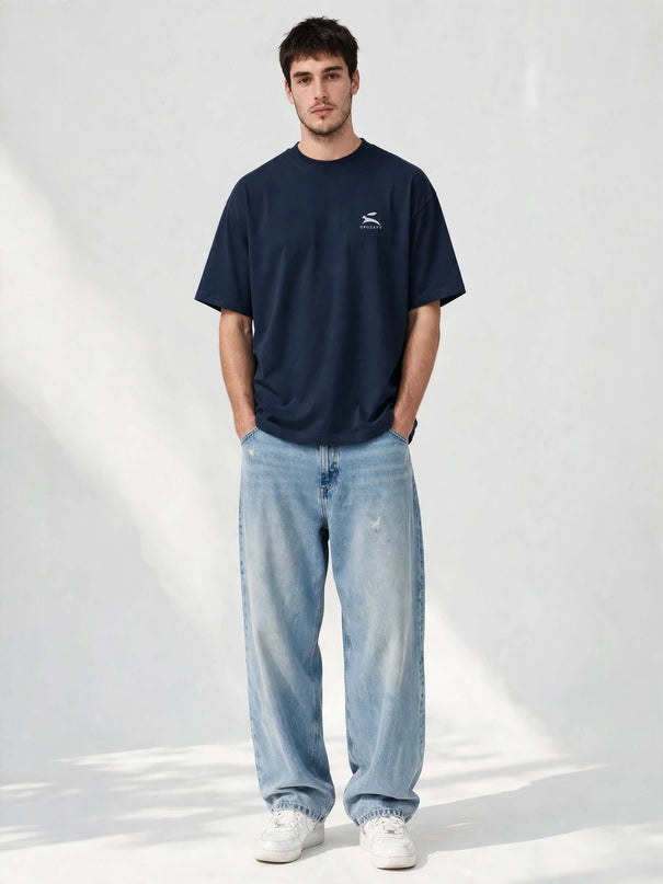 Navy oversized organic tee in 200 g/m² GOTS cotton, worn front view