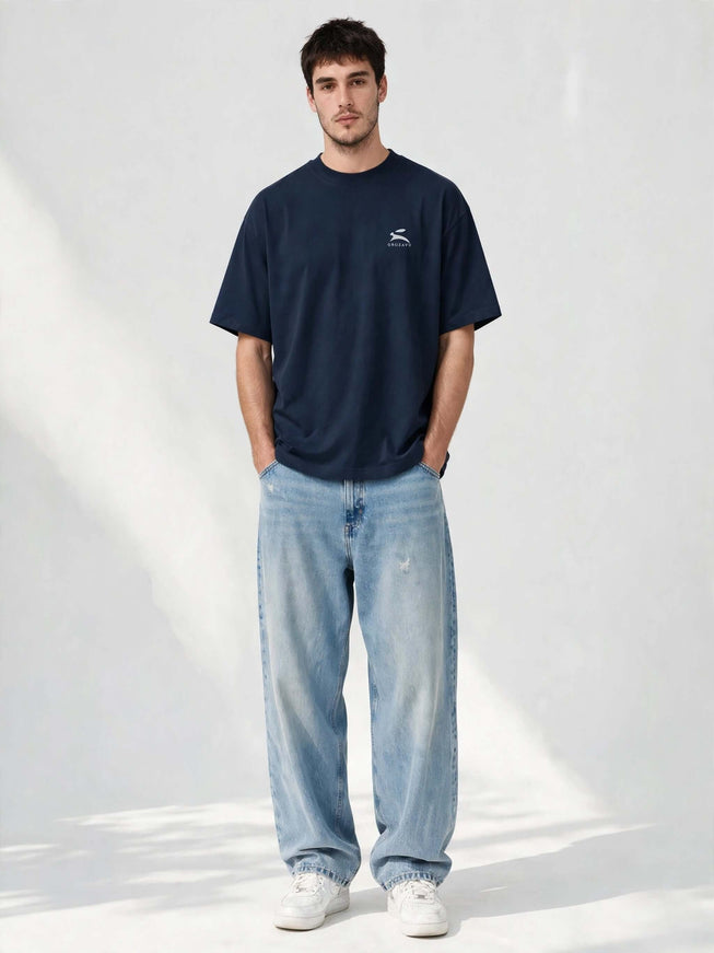 Navy oversized organic tee in 200 g/m² GOTS cotton, worn front view