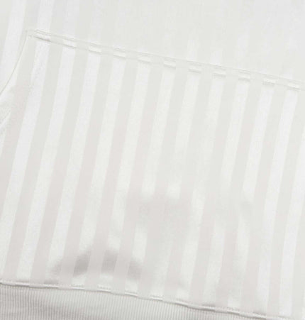 Close-up of the pocket detail on a Retro Dark Stripe Patchwork Hoodie, showcasing the striped design and fabric texture.