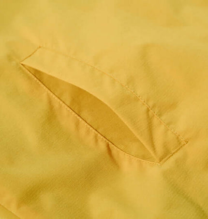 Retro Hooded Zip Jacket – Loose Fit showcasing stylish yellow fabric and pocket detail.