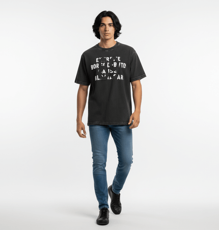 Model wearing Retro Waffle Washed Cotton TShirt with relaxed fit and denim jeans.