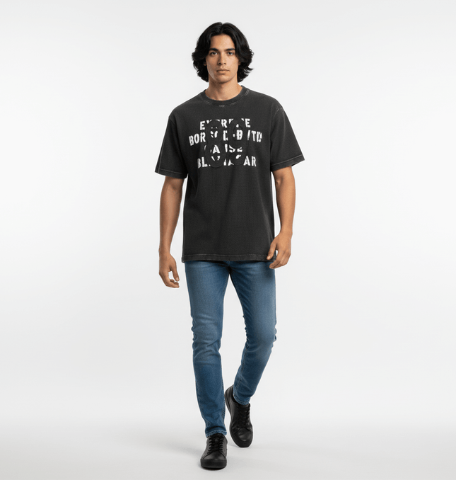 Model wearing Retro Waffle Washed Cotton TShirt with relaxed fit and denim jeans.