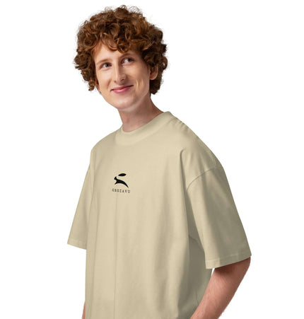 Model wearing the SATU020 High Neck Tee in a beige color, showcasing its oversized fit and modern design.