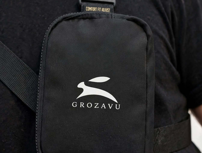 Macro of the nylon taslan and dyed-to-match hardware on the sling bag