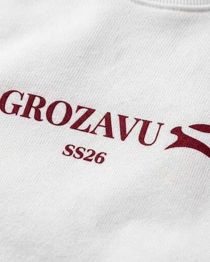 White oversized crewneck in 350 g/m² organic cotton with ribbed cuffs